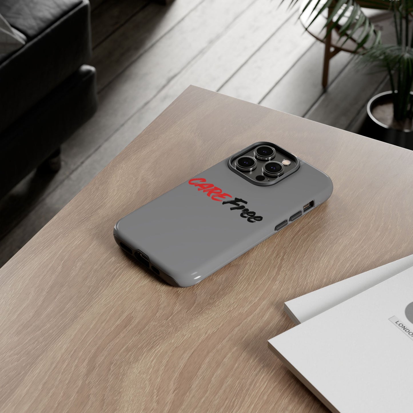 CareFree Tough Phone Case — Slim Protective iPhone Cover with Bold Red & Black Script