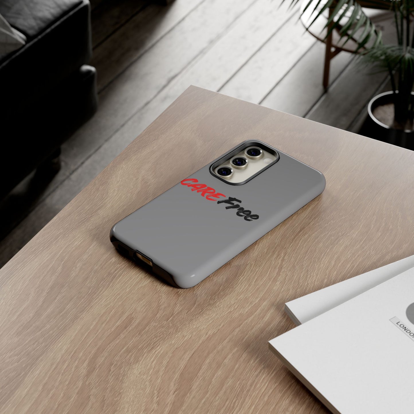 CareFree Tough Phone Case — Slim Protective iPhone Cover with Bold Red & Black Script
