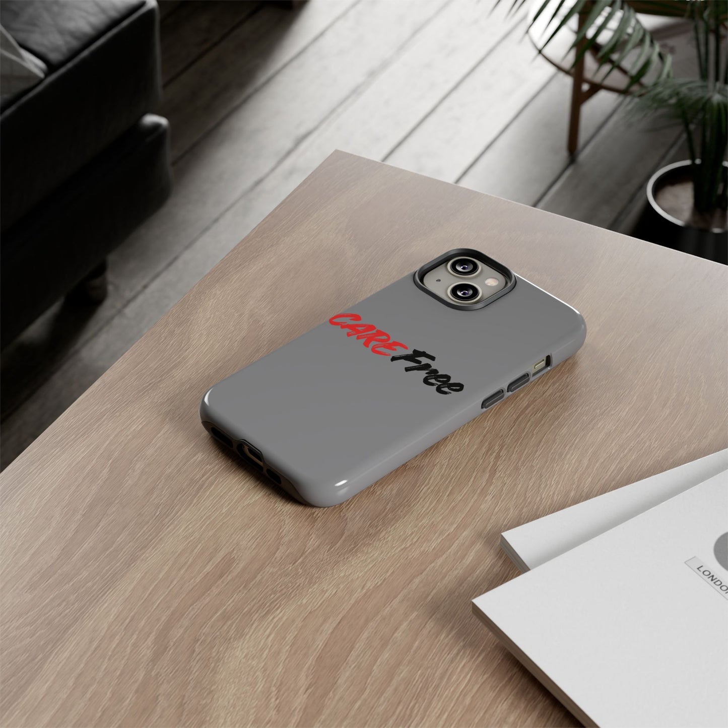 CareFree Tough Phone Case — Slim Protective iPhone Cover with Bold Red & Black Script