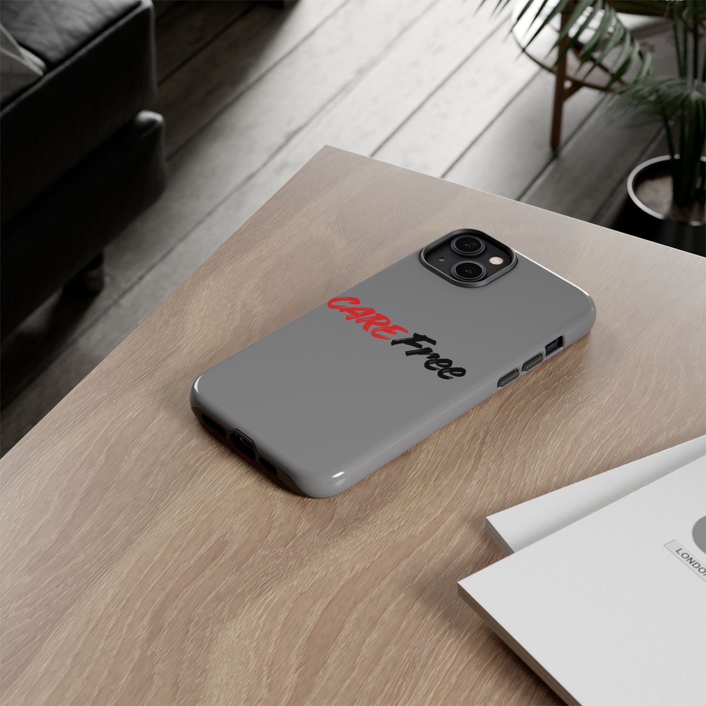CareFree Tough Phone Case — Slim Protective iPhone Cover with Bold Red & Black Script