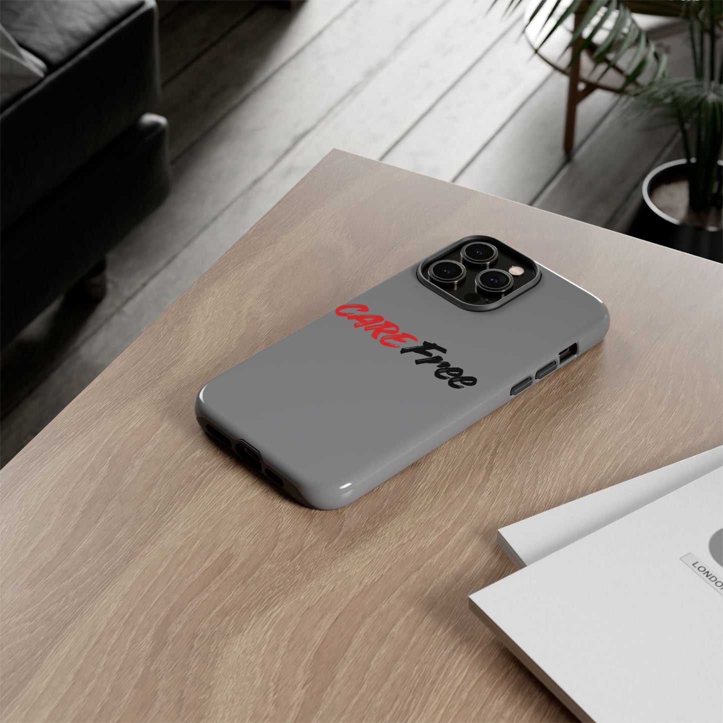 CareFree Tough Phone Case — Slim Protective iPhone Cover with Bold Red & Black Script