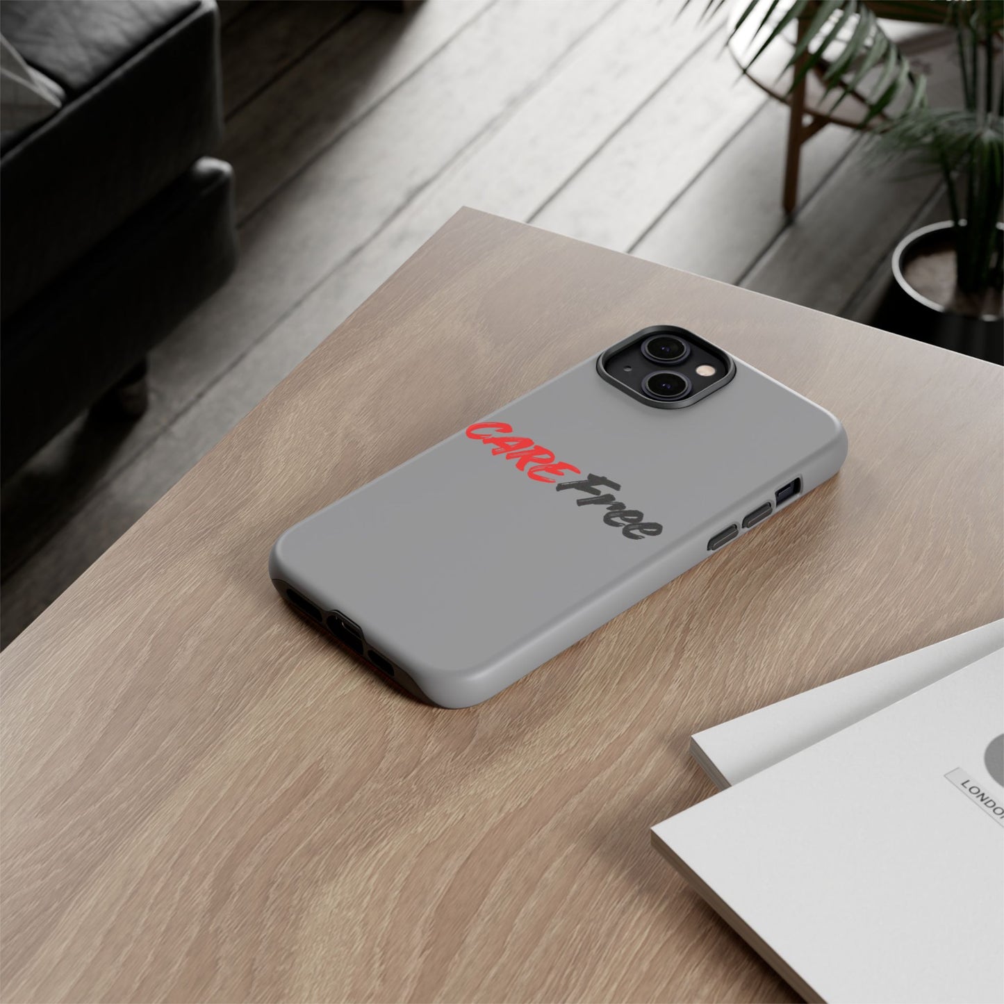 CareFree Tough Phone Case — Slim Protective iPhone Cover with Bold Red & Black Script