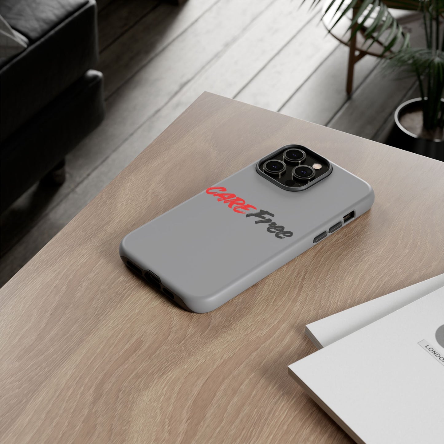 CareFree Tough Phone Case — Slim Protective iPhone Cover with Bold Red & Black Script