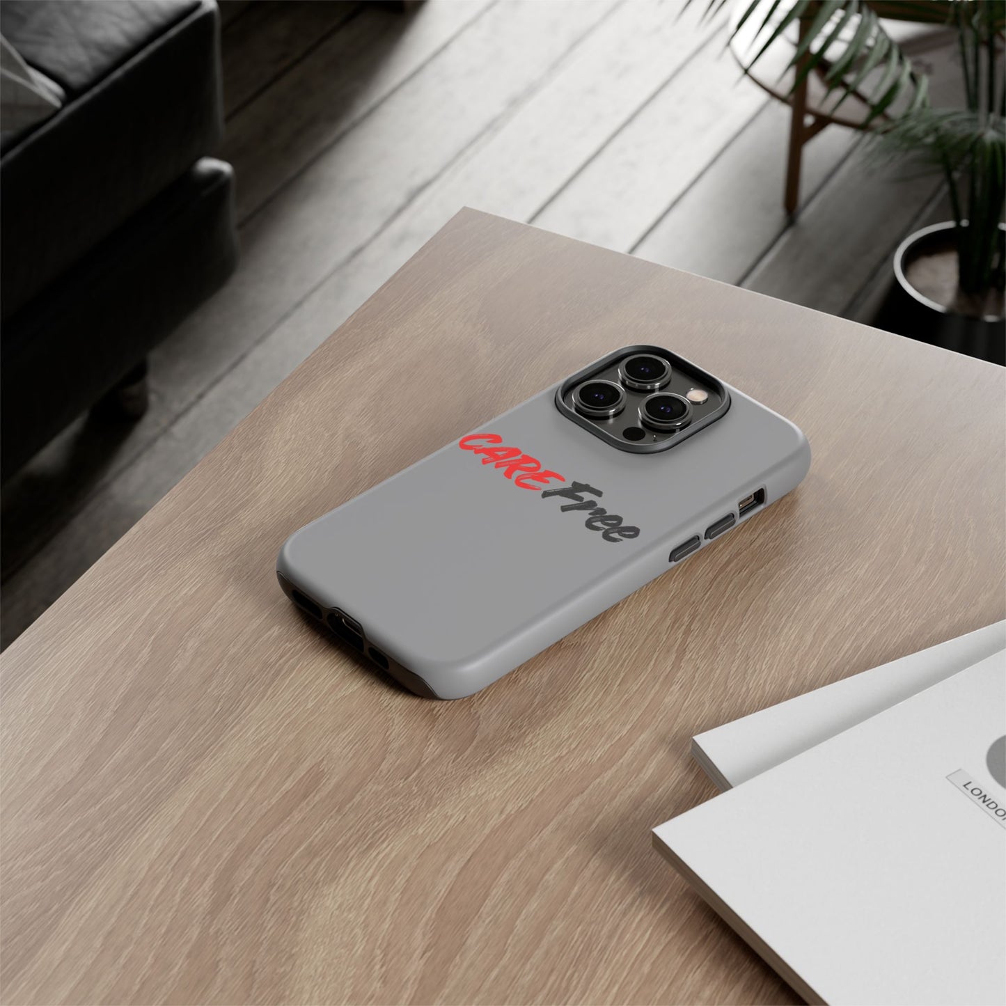 CareFree Tough Phone Case — Slim Protective iPhone Cover with Bold Red & Black Script